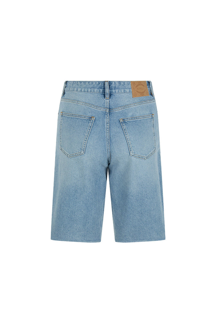 Back flat lay of 1979 Denim Short in vintage blue, showing dual back pockets and Spell leather patch label