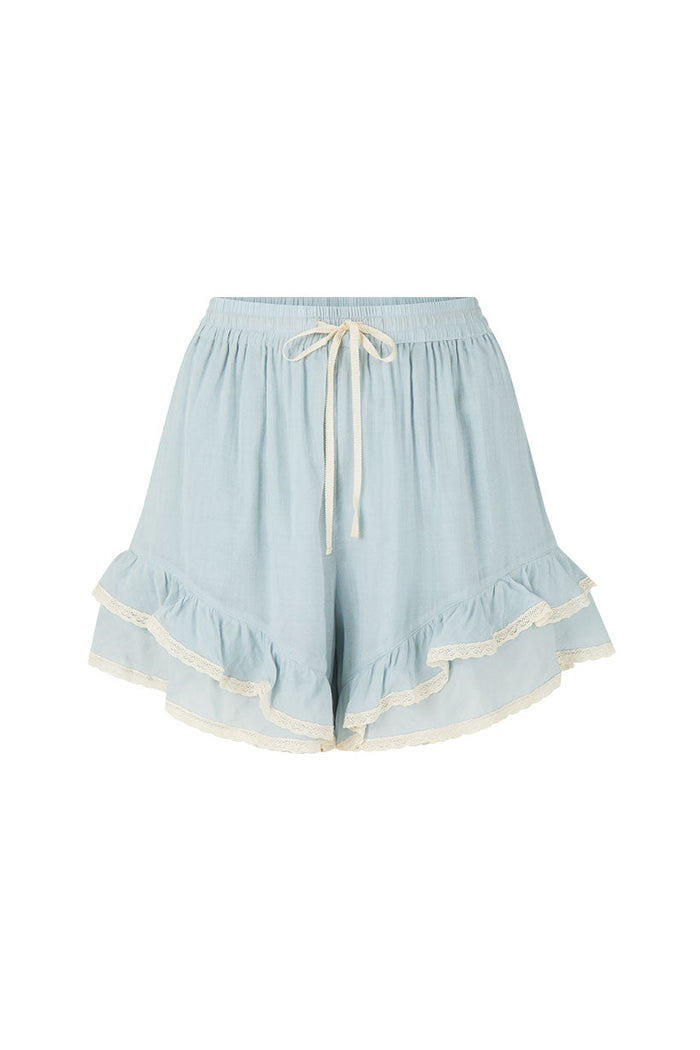 Bluebird Short in Vintage Blue, front flat lay showing lace-trim angled frills and cream drawstring waist