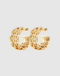 A pair of gold-toned hoop earrings featuring an intricate woven-link design, creating a bold, structured look with a glossy finish and open-back detail