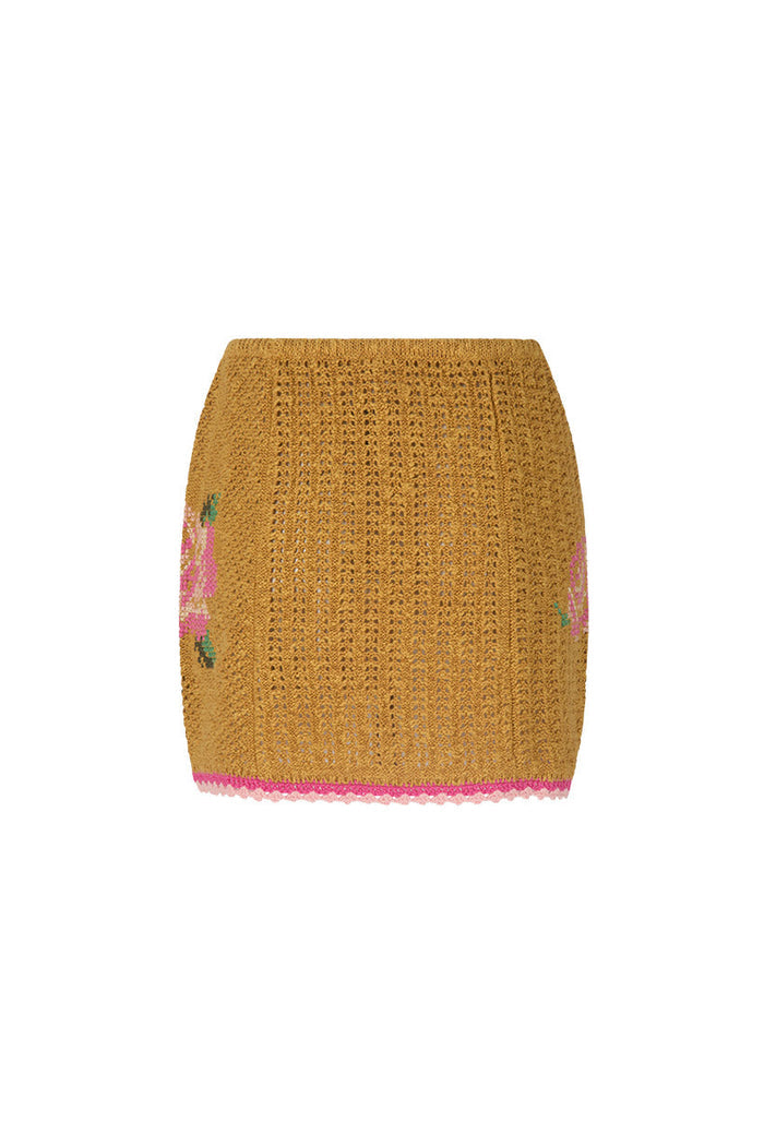 Mustard crochet mini skirt, back flat view, pink floral embroidery and pink scallop hem trim