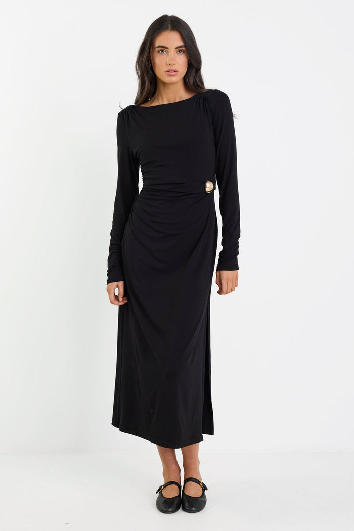 Woman wearing a black dress on a white background