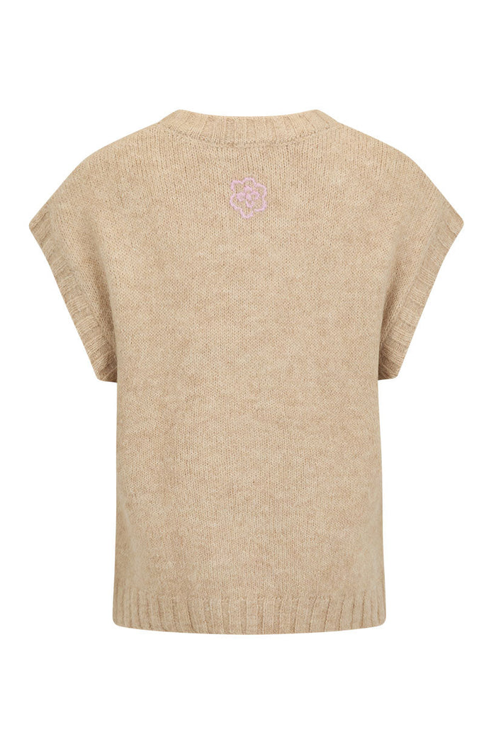 Darcy Vest in Sand, back flat lay showing custom Spell embroidery at back neck and rib hemband