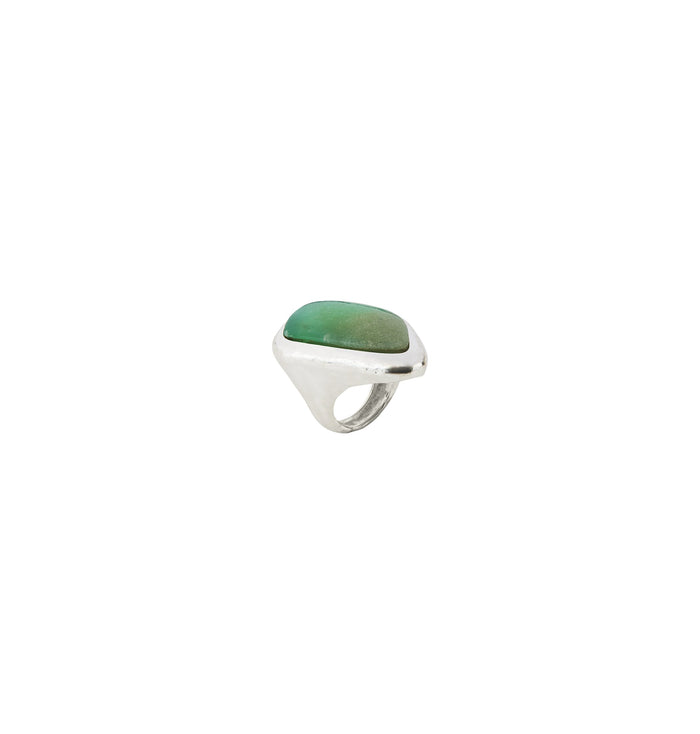 Side view of Desert Flower Stone Ring, silver-plated brass band with cushion-cut green chrysoprase stone