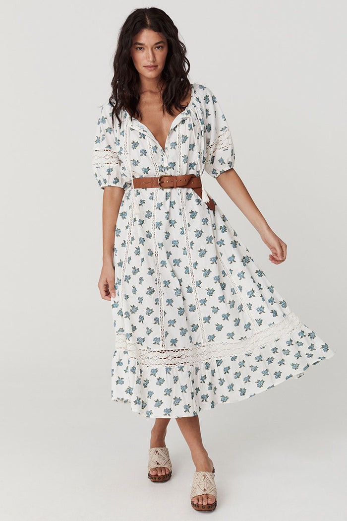Fable Block Printed Midi Dress in Wild Poppy, front view showing lace inserts, corozo buttons and crochet hem trim