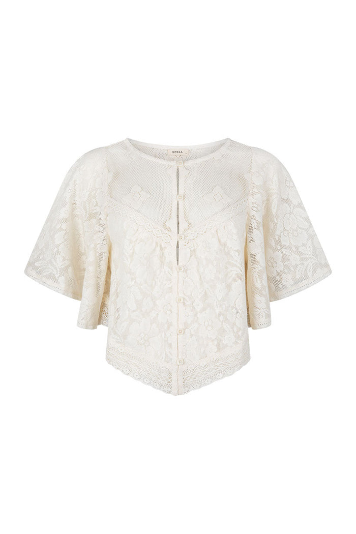 Front flat lay of vintage cream lace crop top with corozo button placket and flutter sleeves on white background