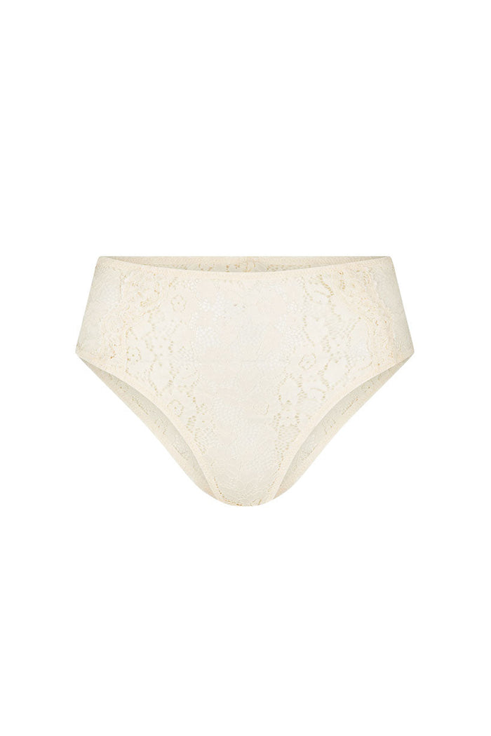 Cream lace high-waisted brief with floral lace pattern and lace-trimmed waist and leg, flat lay on white