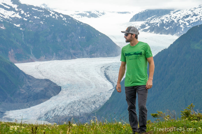 The Glacier Rainforest T-Shirt in front of Mendenhall Glacier