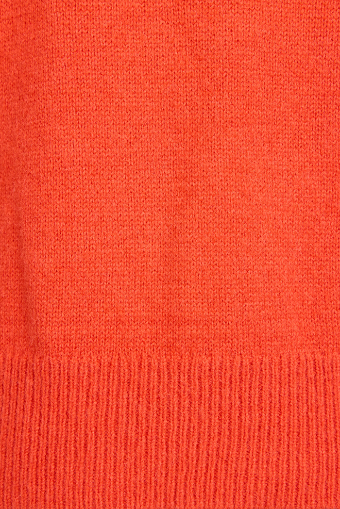 Close-up of a knit orange fabric
