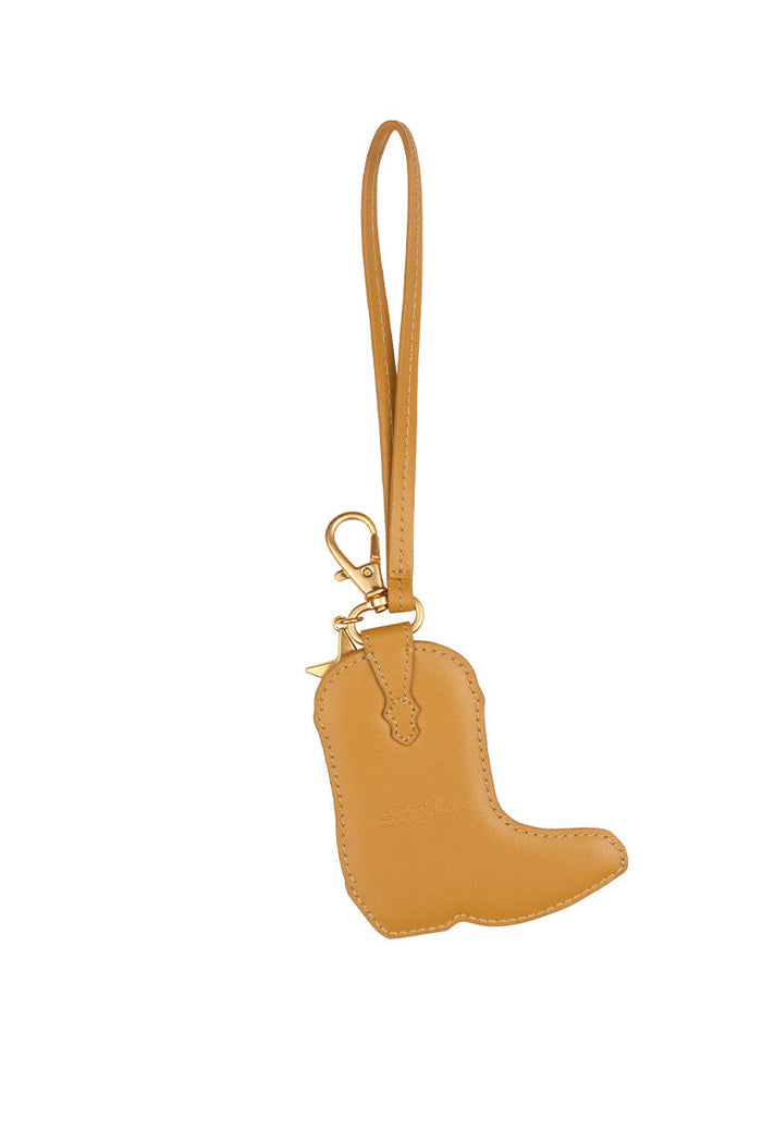 Back view of mustard deadstock leather cowboy boot key ring charm with gold clasp and wrist strap