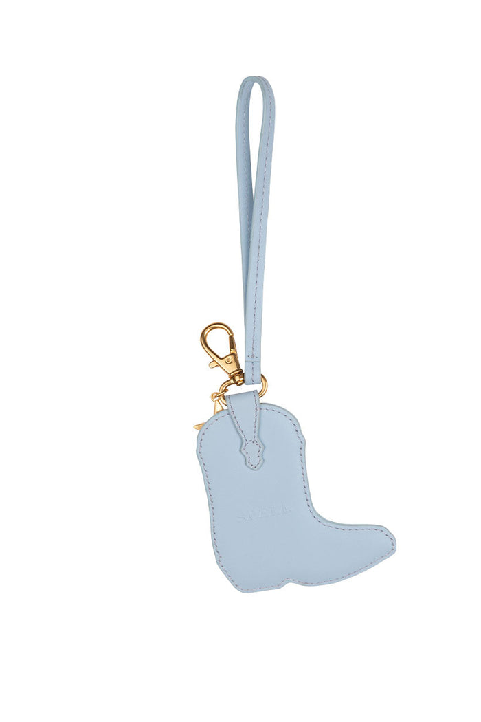 Back view of Horizon Boot Leather Key Ring in Sky with gold clasp and wrist strap on white background