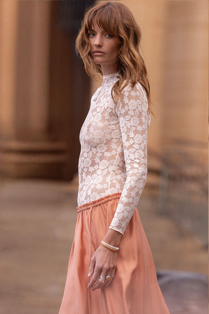 Juliette Lace Top in Vintage Cream, flat lay showing floral lace, high neck, and long sleeves