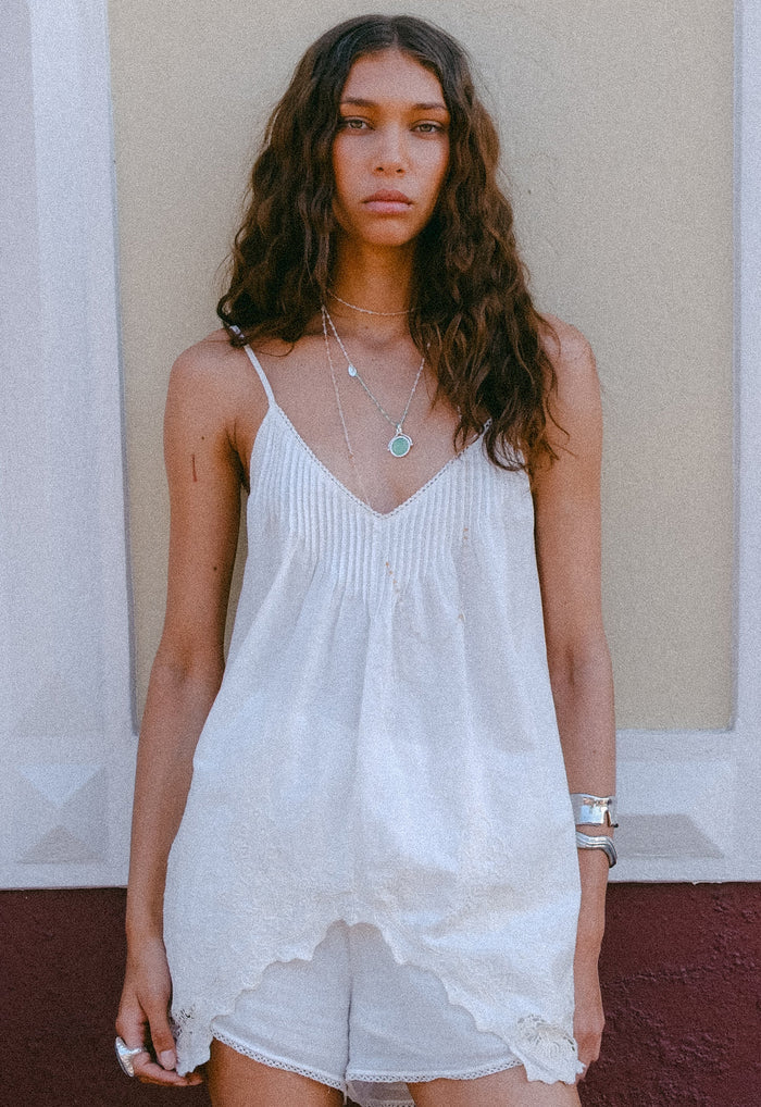 White Lily Kala Handkerchief Cami front view, pintuck bust, V-neck, lace-trim hem embroidery detail