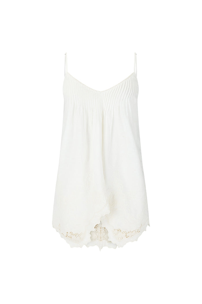 White Lily organic cotton linen cami, front flat lay showing pintuck bust, V-neck, and floral lace-trim handkerchief hem