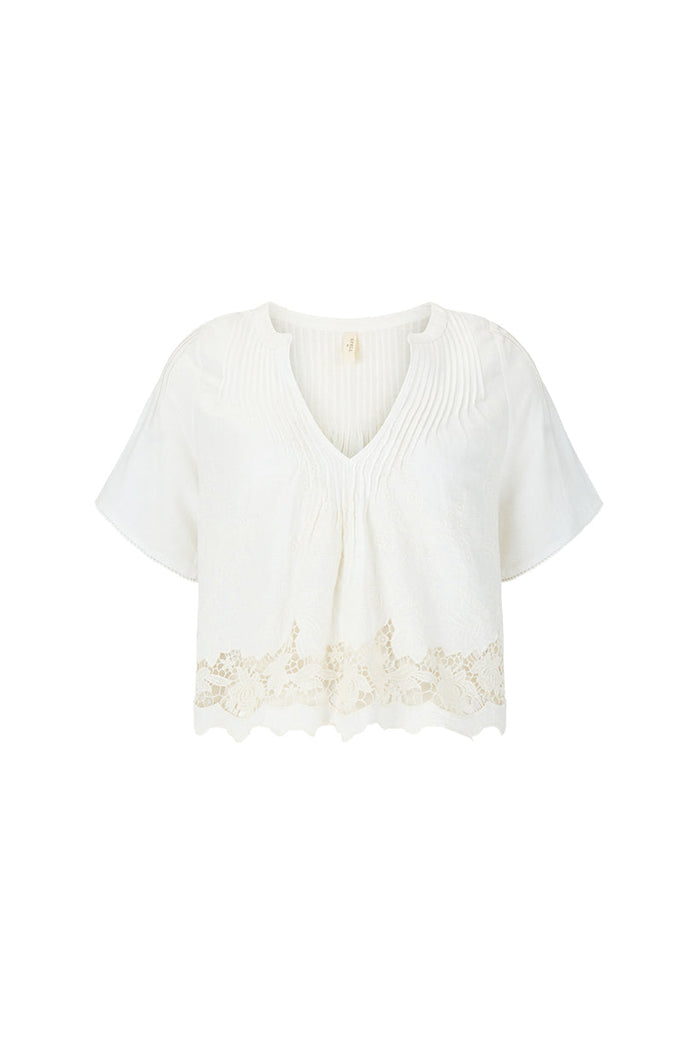 Kala Short Sleeve Blouse flat lay, white, pintuck bodice, floral lace hem, cropped V-neck in organic cotton-linen