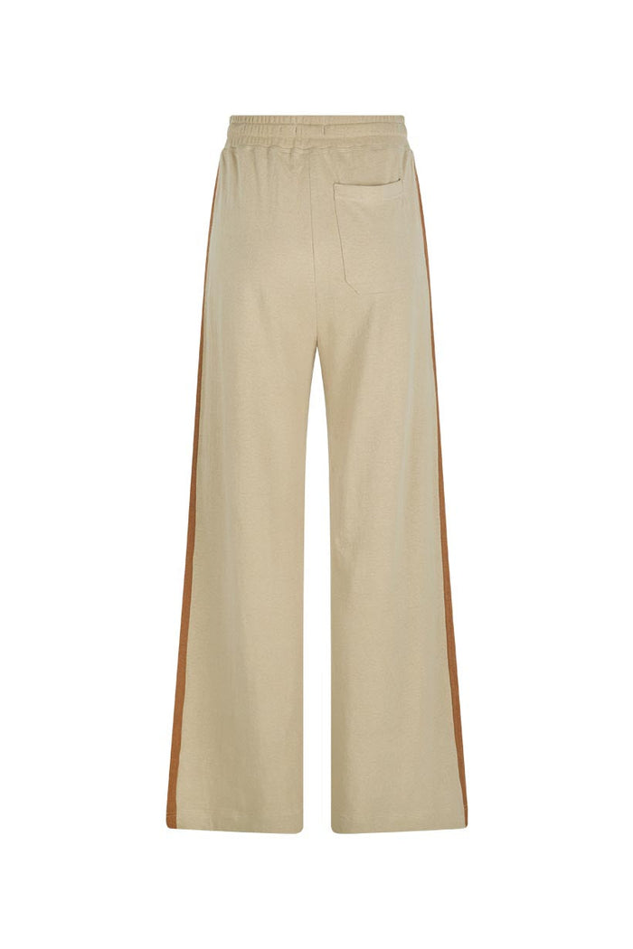 Back flat lay of Kansas Track Flare Pant in Stone, showing contrast brown side stripe, elastic waist and back patch pocket