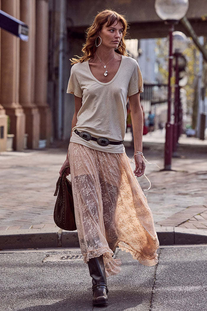 Peach Bliss lace maxi skirt flat lay showing hi-lo hem, edge lace trim, and slip lining, front view