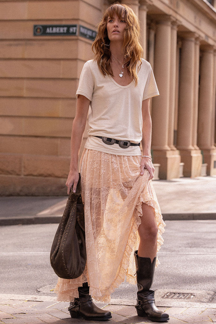 Peach Bliss lace maxi skirt flat lay showing hi-lo hem, edge lace trim, and slip lining, front view