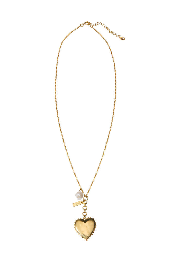 Lonely Hearts Charm Necklace flat lay showing 22K gold-plated heart pendant, small opal charm, and fine chain with extender