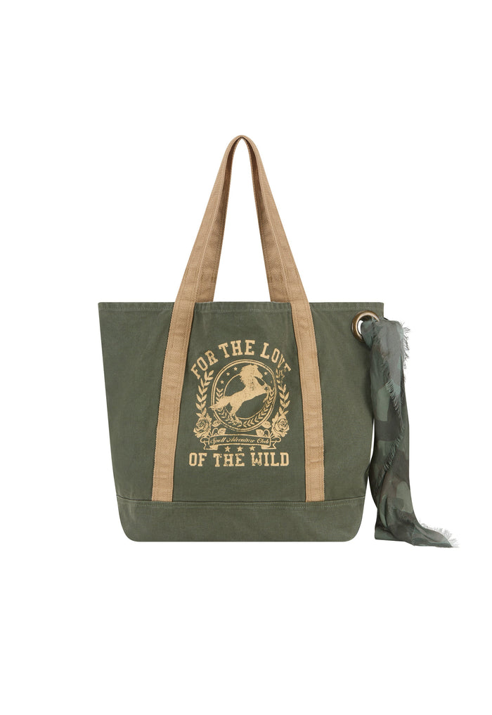 An olive green canvas tote bag with tan shoulder straps and a matching olive green scarf, featuring a tan graphic print on the front with the text 'FOR THE LOVE OF THE WILD'.