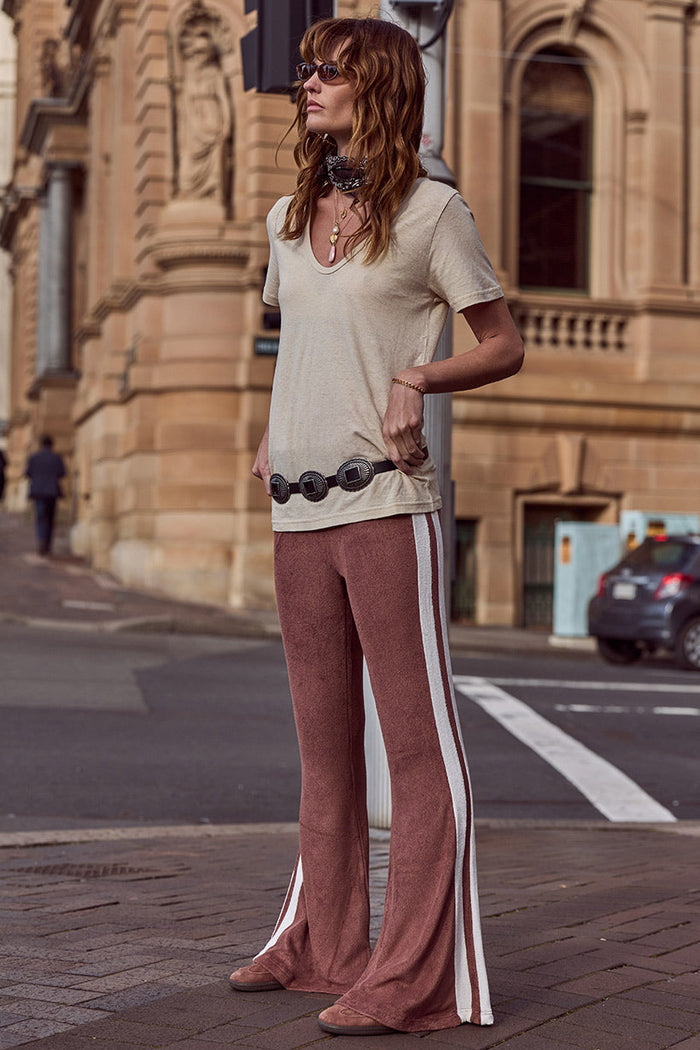 Spell women's Luciana Terry Flares in Chocolate, brown viscose flared pants with cream contrast side stripe