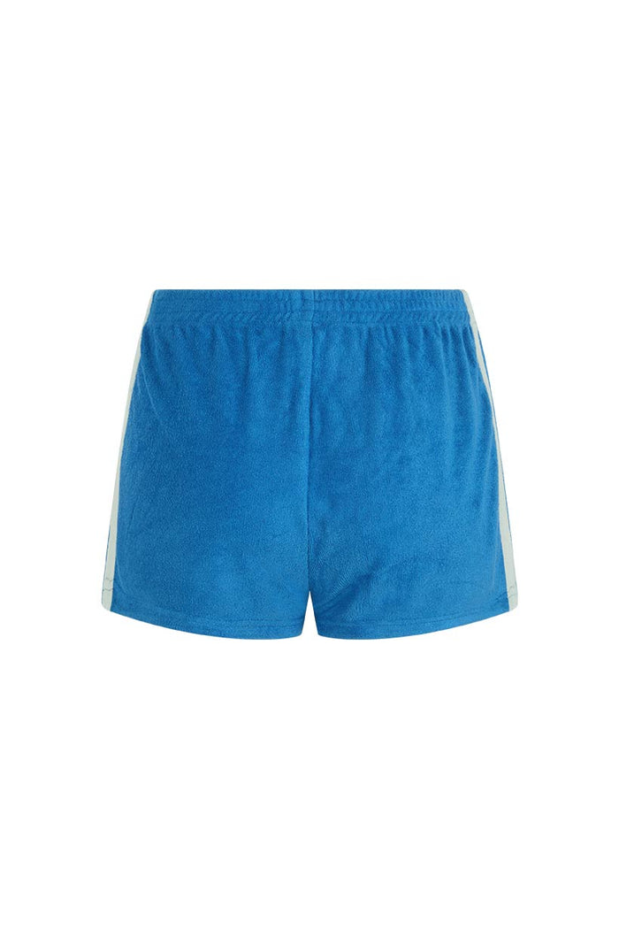 Back flat lay of Luciana Terry Short in azure blue, showing contrast side stripe and elastic waist