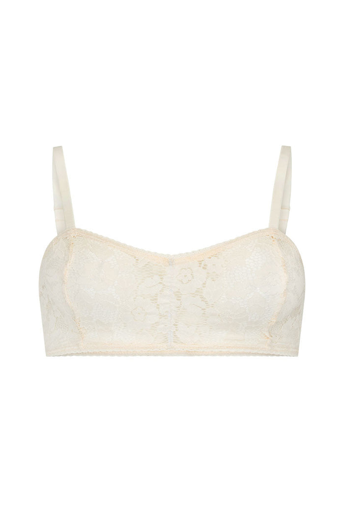 Front flat lay of cream lace bralette with adjustable straps and scalloped lace trim neckline