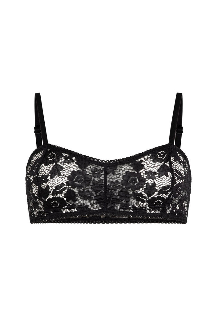 Front flat lay of black floral lace bralette with scallop trim and adjustable straps on white background