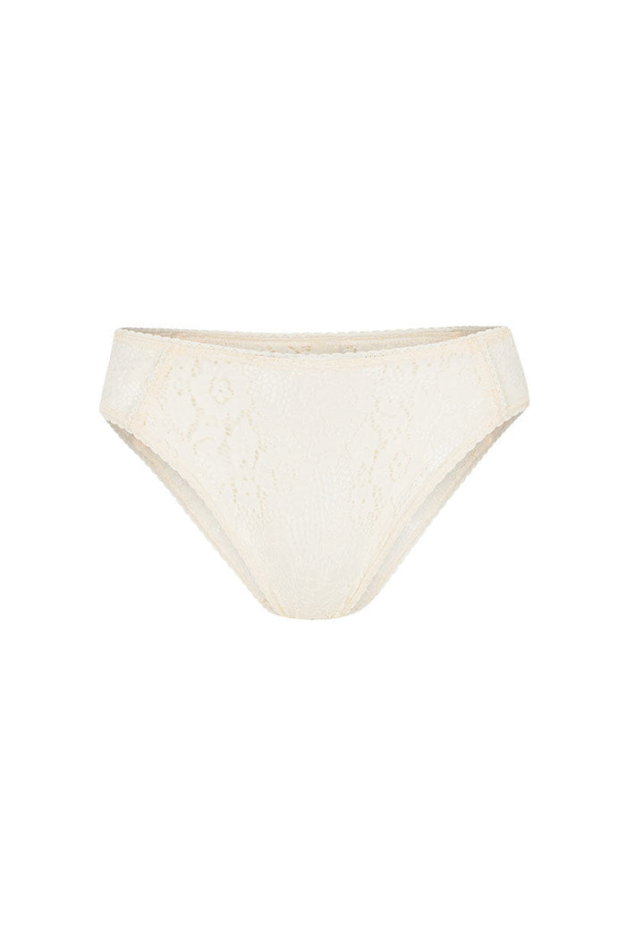 Vintage cream lace brief with scallop waist and leg trim, flat lay on white background