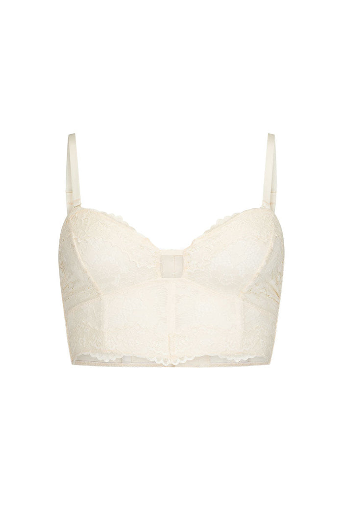 Front flat lay of cream lace bustier with scallop-trim cups, adjustable straps, and structured boning on white background