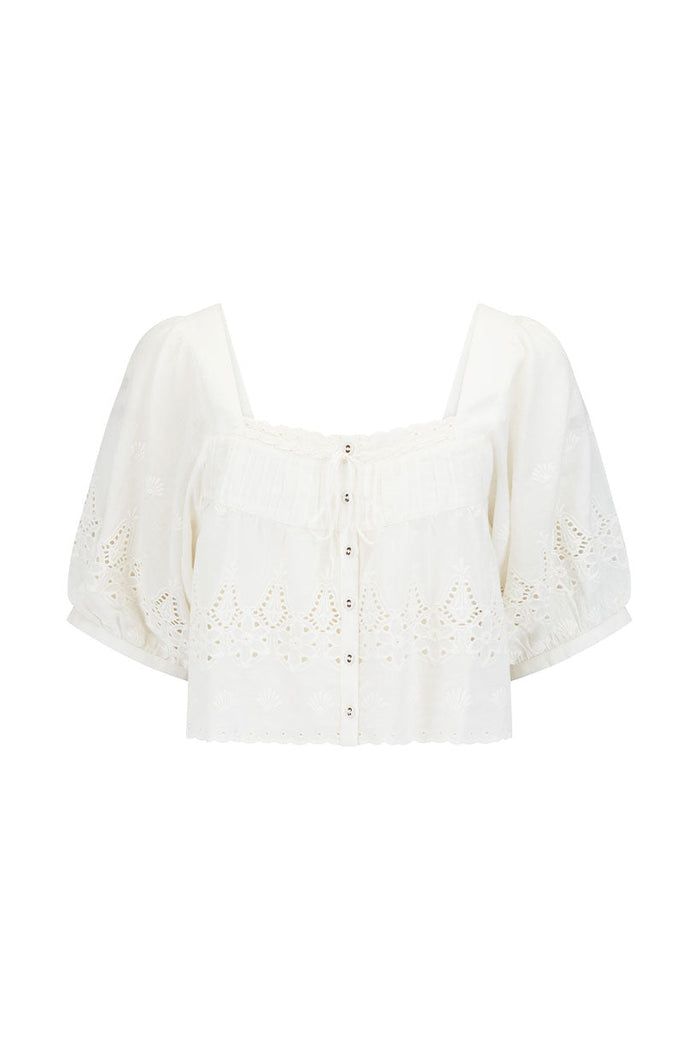 Antique white organic cotton voile blouse, front flat lay showing broderie anglaise hem and puff sleeves