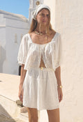 Front view of Maiden Lace Mini Skirt in antique white, elasticated waist with inserted lace and anglaise broderie hem