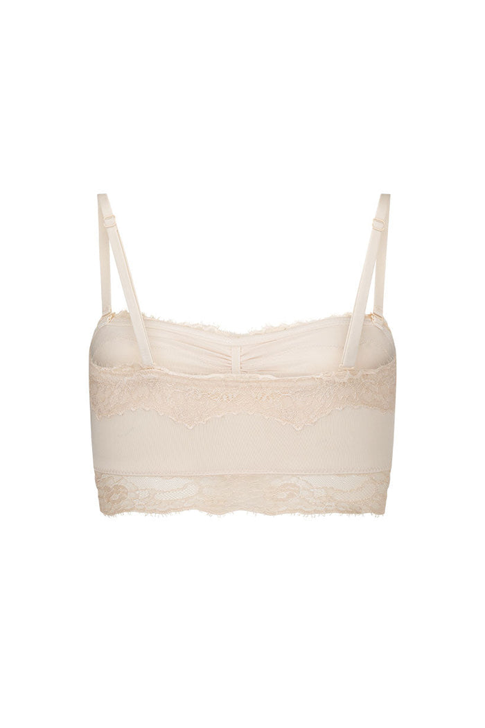 Melody Bandeau in Antique Creme, back view on white background, adjustable straps and lace border detail