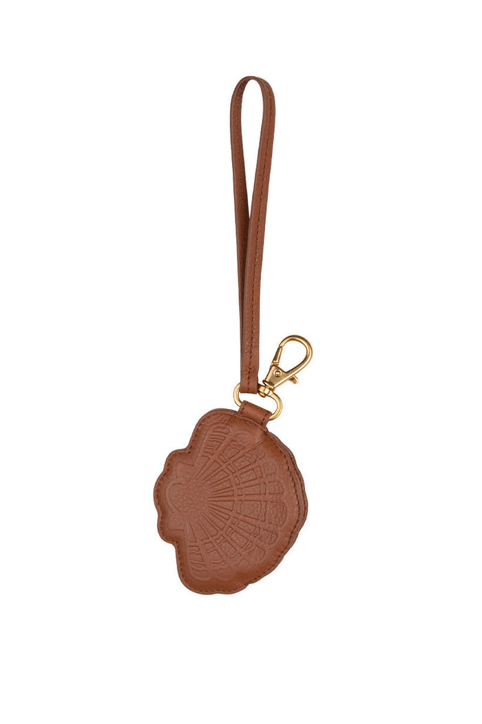 Spell Mermaid Shell Leather Coin Purse in tan with embossed shell design and gold clasp wrist strap