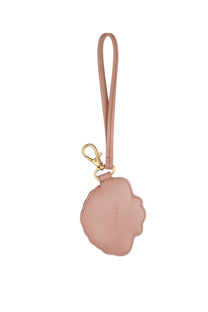 Back view of Mermaid Shell leather coin purse in dusty pink, showing embossed Spell logo and gold clasp hardware