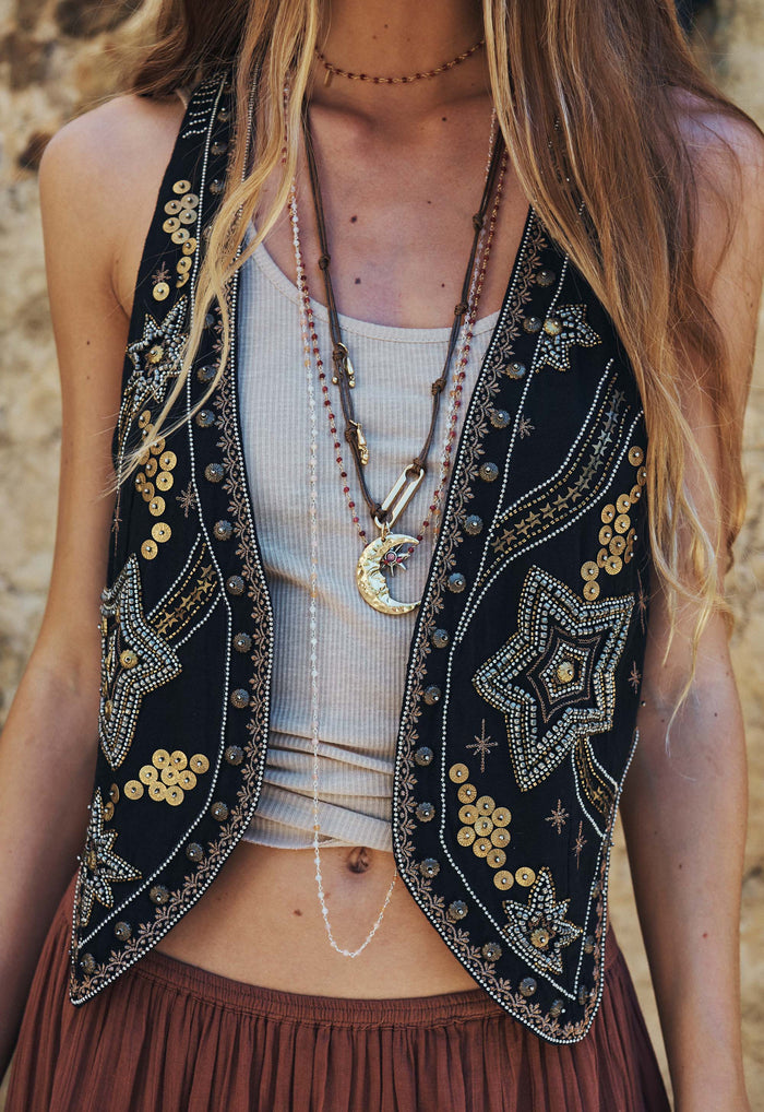 Model wearing Night Sky Vest in Midnight, front view showing gold sequin and bead star embellishments