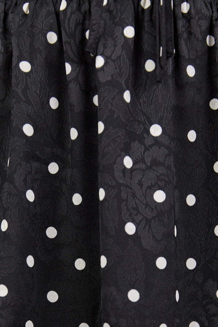 Black polka dot skirt with floral patterns