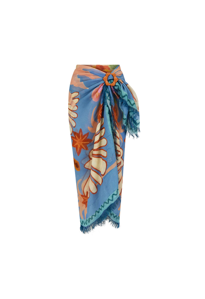 Sea blue modal scarf styled as sarong with floral print, frayed edges, and orange flower buckle, white background