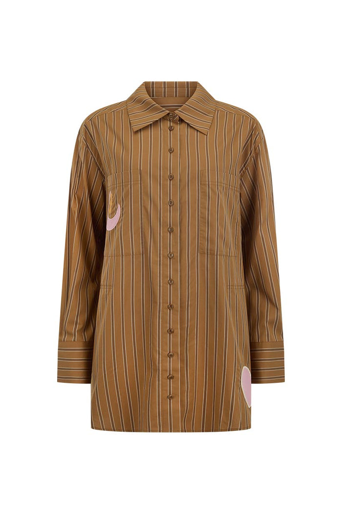 Front flat lay of caramel stripe organic cotton shirt with button front, dropped shoulders and pink appliqué