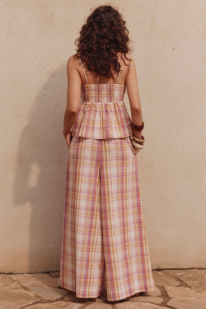 Back view of Patti Pant in Golden Haze check, showing wide-leg silhouette, elastic waist and front pockets