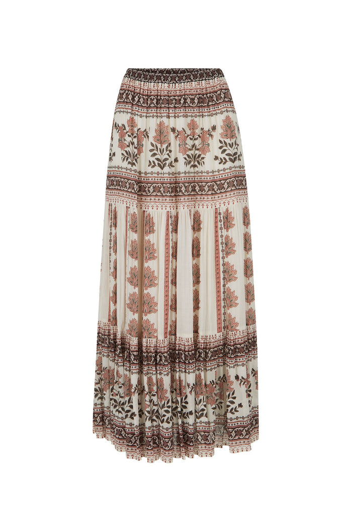 A bohemian-style pleated maxi skirt with a cream base and brown, rust, and black botanical and tribal patterns, shown against a plain white background.