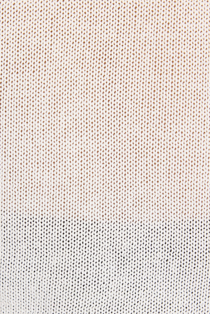 Close up of white knit top.