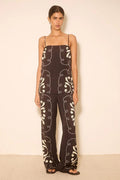 Woman wears a black and white print matching set