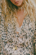 Spell women's Snow Leopard Asymmetric Blouse in cream organic cotton ECOVERO blend with contrast lace trim