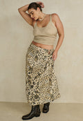 Snow Leopard Bias Maxi Skirt in animal print, front view showing drawcord waist and bias-cut silhouette