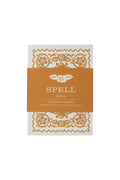 Spell Journal in Sand, white hardcover notebook with gold floral print and amber branded belly band