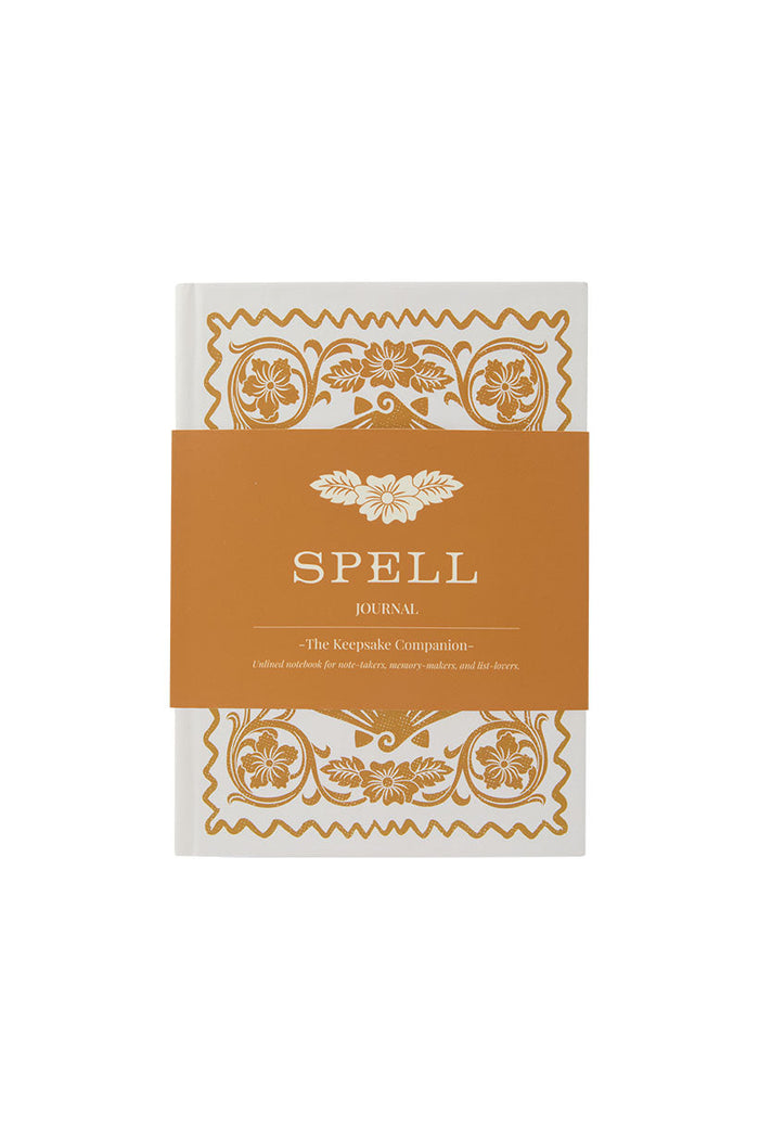 Spell Journal in Sand, white hardcover notebook with gold floral print and amber branded belly band