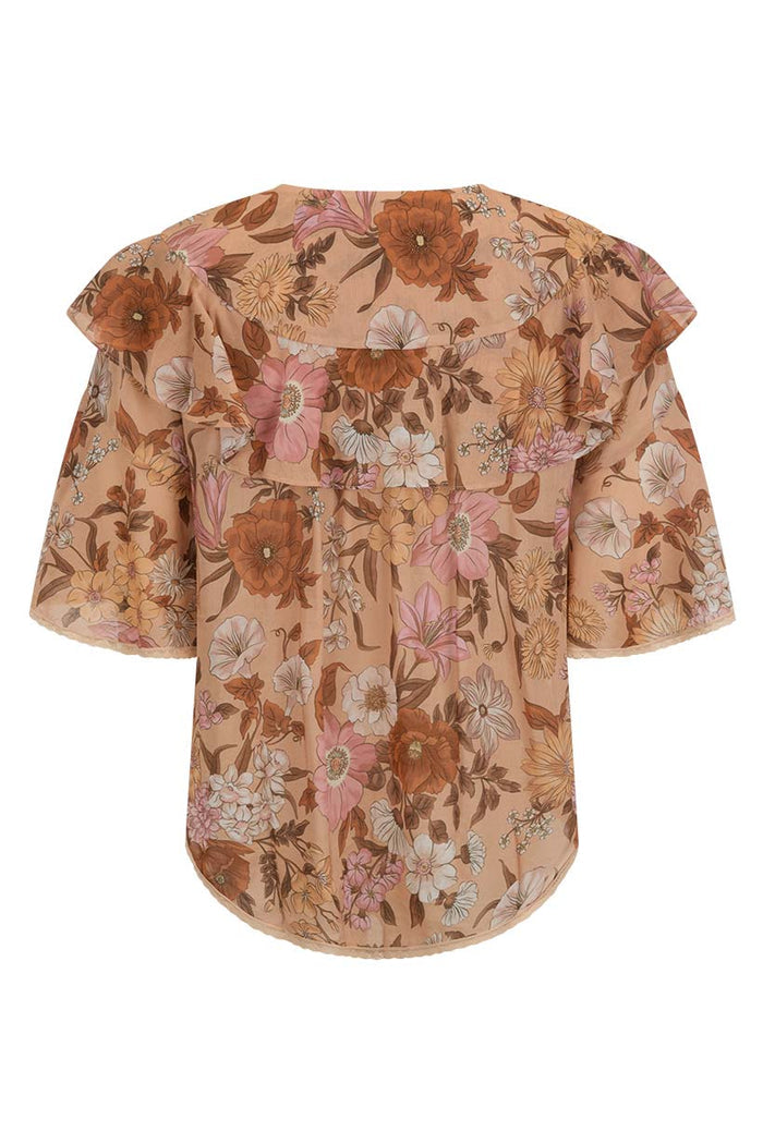 Back flat lay of Stealing Beauty blouse in Rose Quartz floral, showing ruffle yoke and shaped lace-trim hem