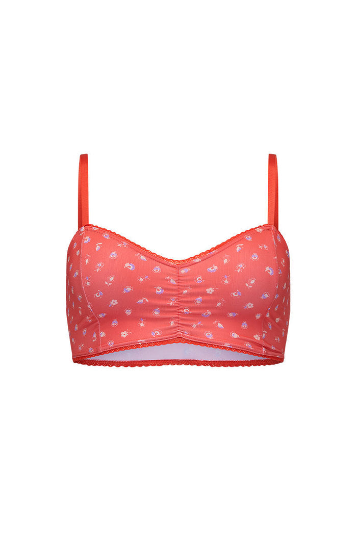 Cayenne floral bralette flat lay on white, showing lace border trim and centre-front ruching detail