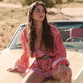 Spell-SunshineBandit-Romper-Cayenne-SQUARE_6c59d270-7349-46a7-8aee-f053a12525e8.jpg