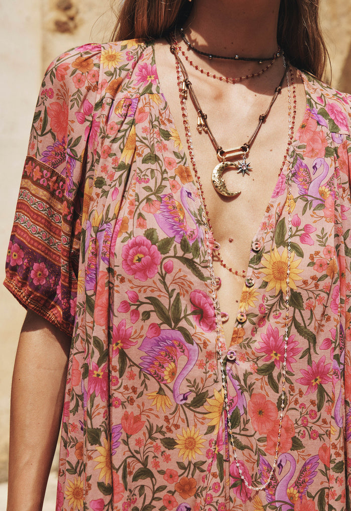 Close-up of V-neckline with front placket button opening on Swan Lake Mini Dress, Lilac Rose floral print